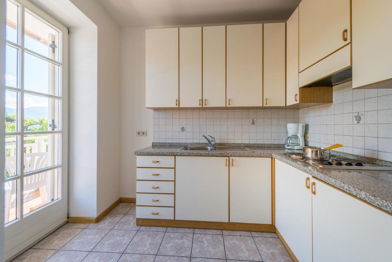 Ferienwohnungen Sonnenburg Caldaro Bagian luar foto